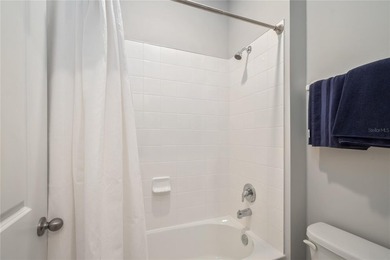 Built in 2023, this eye-catching home has plenty of curb appeal on Trilogy at Ocala Preserve in Florida - for sale on GolfHomes.com, golf home, golf lot