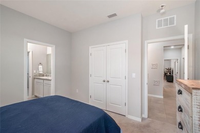 Built in 2023, this eye-catching home has plenty of curb appeal on Trilogy at Ocala Preserve in Florida - for sale on GolfHomes.com, golf home, golf lot