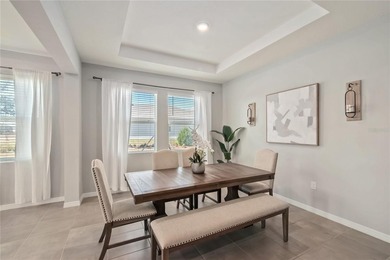 Built in 2023, this eye-catching home has plenty of curb appeal on Trilogy at Ocala Preserve in Florida - for sale on GolfHomes.com, golf home, golf lot