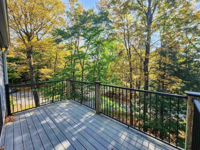 Welcome to this beautifully updated 3-bed, 2.5-bath condo on Quechee Club in Vermont - for sale on GolfHomes.com, golf home, golf lot