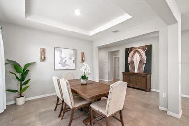 Built in 2023, this eye-catching home has plenty of curb appeal on Trilogy at Ocala Preserve in Florida - for sale on GolfHomes.com, golf home, golf lot