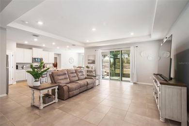 Built in 2023, this eye-catching home has plenty of curb appeal on Trilogy at Ocala Preserve in Florida - for sale on GolfHomes.com, golf home, golf lot