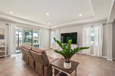 Built in 2023, this eye-catching home has plenty of curb appeal on Trilogy at Ocala Preserve in Florida - for sale on GolfHomes.com, golf home, golf lot