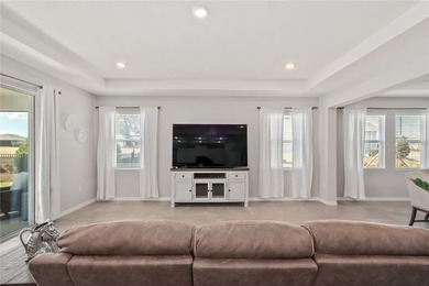 Built in 2023, this eye-catching home has plenty of curb appeal on Trilogy at Ocala Preserve in Florida - for sale on GolfHomes.com, golf home, golf lot