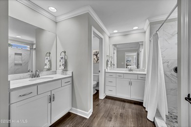 Stunning Coastal Craftsman Style 5 Bedroom, 3 Bath Home located on Beau Rivage Golf and Resort in North Carolina - for sale on GolfHomes.com, golf home, golf lot