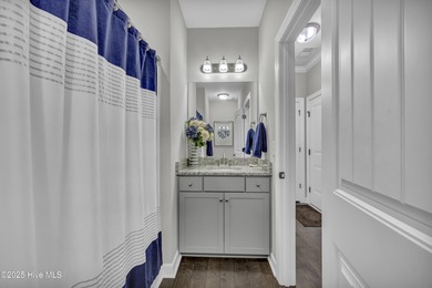 Stunning Coastal Craftsman Style 5 Bedroom, 3 Bath Home located on Beau Rivage Golf and Resort in North Carolina - for sale on GolfHomes.com, golf home, golf lot