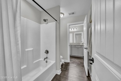 Stunning Coastal Craftsman Style 5 Bedroom, 3 Bath Home located on Beau Rivage Golf and Resort in North Carolina - for sale on GolfHomes.com, golf home, golf lot