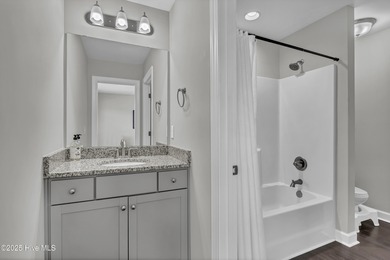 Stunning Coastal Craftsman Style 5 Bedroom, 3 Bath Home located on Beau Rivage Golf and Resort in North Carolina - for sale on GolfHomes.com, golf home, golf lot