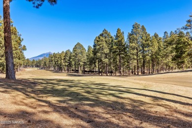 Nestled on the 4th fairway of the prestigious Flagstaff Ranch on Flagstaff Ranch Golf Club in Arizona - for sale on GolfHomes.com, golf home, golf lot