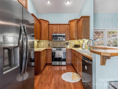 Don't miss this low-maintenance townhouse offered at a fantastic on Connestee Falls Golf Club in North Carolina - for sale on GolfHomes.com, golf home, golf lot