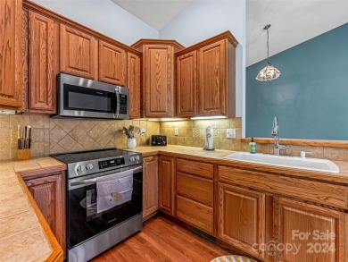 Don't miss this low-maintenance townhouse offered at a fantastic on Connestee Falls Golf Club in North Carolina - for sale on GolfHomes.com, golf home, golf lot