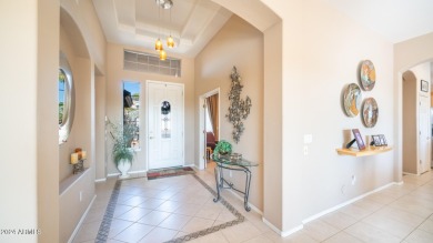 Welcome to this stunner model home on the golf course, boasting on Augusta Ranch Golf Club in Arizona - for sale on GolfHomes.com, golf home, golf lot