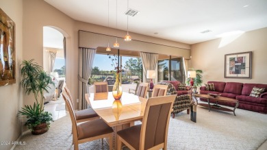 Welcome to this stunner model home on the golf course, boasting on Augusta Ranch Golf Club in Arizona - for sale on GolfHomes.com, golf home, golf lot