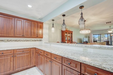 Enjoy peaceful golf course views from this be 2-bedroom, 2-bath on Heritage Ridge Golf Club in Florida - for sale on GolfHomes.com, golf home, golf lot