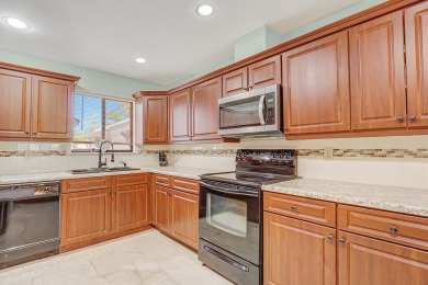 Enjoy peaceful golf course views from this be 2-bedroom, 2-bath on Heritage Ridge Golf Club in Florida - for sale on GolfHomes.com, golf home, golf lot