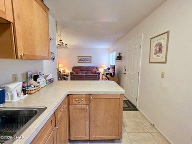 Step into easy Lake Havasu living in this inviting 2 bedroom, 1 on London Bridge Golf Course in Arizona - for sale on GolfHomes.com, golf home, golf lot