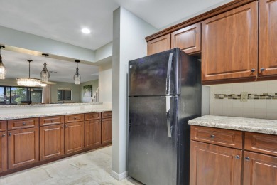 Enjoy peaceful golf course views from this be 2-bedroom, 2-bath on Heritage Ridge Golf Club in Florida - for sale on GolfHomes.com, golf home, golf lot