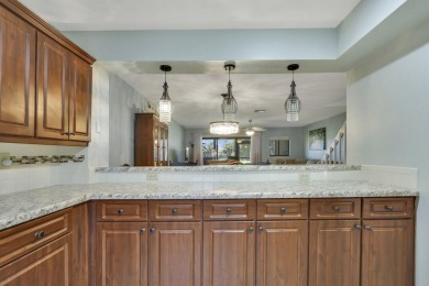 Enjoy peaceful golf course views from this be 2-bedroom, 2-bath on Heritage Ridge Golf Club in Florida - for sale on GolfHomes.com, golf home, golf lot