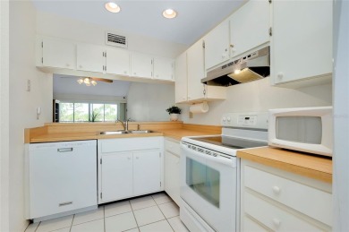 TOP-FLOOR ELEGANCE WITH SWEEPING GOLF  LAKE VIEWS!

This on Plantation Golf and Country Club in Florida - for sale on GolfHomes.com, golf home, golf lot