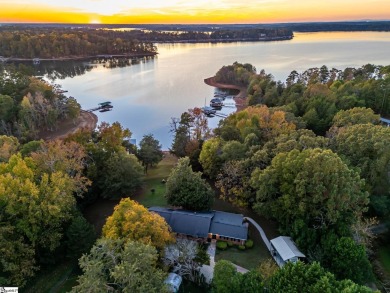 Lakeside Charm & Endless Possibilities on Lake Hartwell! Nestled on Stone Creek Cove Golf Course in South Carolina - for sale on GolfHomes.com, golf home, golf lot