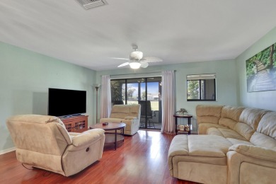 Enjoy peaceful golf course views from this be 2-bedroom, 2-bath on Heritage Ridge Golf Club in Florida - for sale on GolfHomes.com, golf home, golf lot