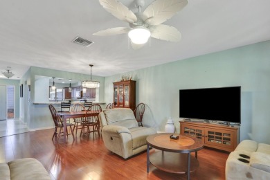 Enjoy peaceful golf course views from this be 2-bedroom, 2-bath on Heritage Ridge Golf Club in Florida - for sale on GolfHomes.com, golf home, golf lot