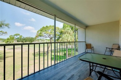 TOP-FLOOR ELEGANCE WITH SWEEPING GOLF  LAKE VIEWS!

This on Plantation Golf and Country Club in Florida - for sale on GolfHomes.com, golf home, golf lot