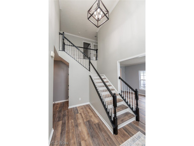 Tucked within the Shale Creek community, this beautifully on Shale Creek Golf Club in Ohio - for sale on GolfHomes.com, golf home, golf lot