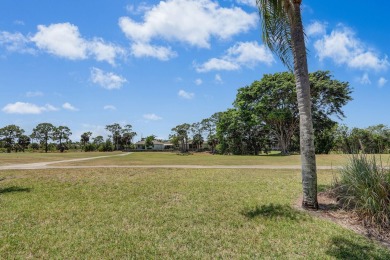 Enjoy peaceful golf course views from this be 2-bedroom, 2-bath on Heritage Ridge Golf Club in Florida - for sale on GolfHomes.com, golf home, golf lot