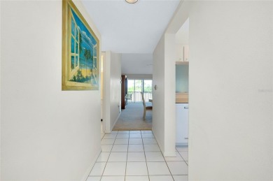 TOP-FLOOR ELEGANCE WITH SWEEPING GOLF  LAKE VIEWS!

This on Plantation Golf and Country Club in Florida - for sale on GolfHomes.com, golf home, golf lot