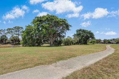 Enjoy peaceful golf course views from this be 2-bedroom, 2-bath on Heritage Ridge Golf Club in Florida - for sale on GolfHomes.com, golf home, golf lot