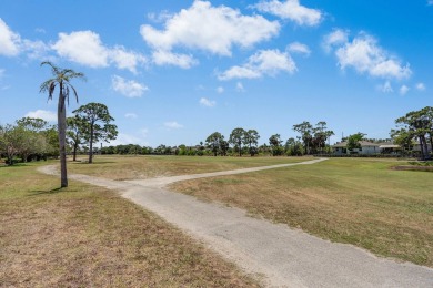 Enjoy peaceful golf course views from this be 2-bedroom, 2-bath on Heritage Ridge Golf Club in Florida - for sale on GolfHomes.com, golf home, golf lot