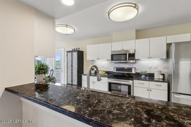 Exceptional corner penthouse in exclusive Spyglass Villas at on Amelia Island Plantation - Long Point in Florida - for sale on GolfHomes.com, golf home, golf lot