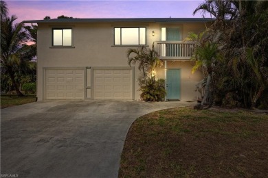 Discover this delightful Olde Florida-style, two-story home on The Colony Golf and Country Club in Florida - for sale on GolfHomes.com, golf home, golf lot