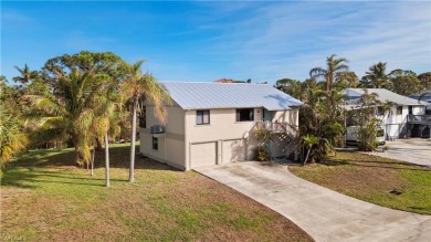 Discover this delightful Olde Florida-style, two-story home on The Colony Golf and Country Club in Florida - for sale on GolfHomes.com, golf home, golf lot