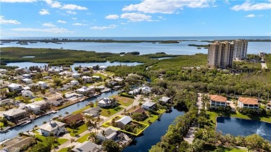 Discover this delightful Olde Florida-style, two-story home on The Colony Golf and Country Club in Florida - for sale on GolfHomes.com, golf home, golf lot