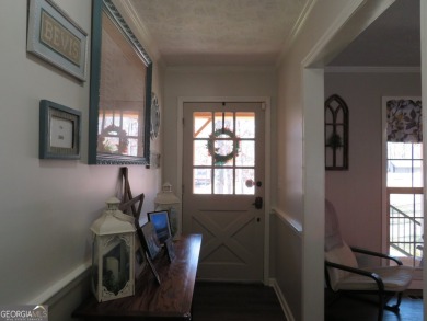 Sprawling brick ranch over full basement located in great area on Cherokee Golf and Country Club in Georgia - for sale on GolfHomes.com, golf home, golf lot