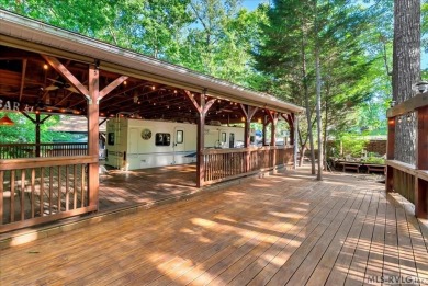 Lake life made easy--and fun! This Lake Gaston camper sits on a on River Ridge Golf Club in Virginia - for sale on GolfHomes.com, golf home, golf lot