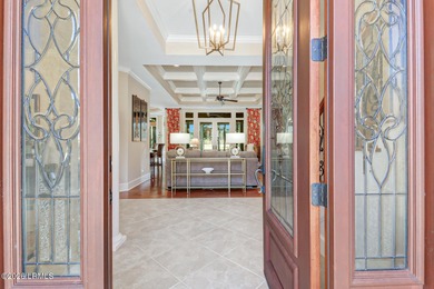 Boasting expansive golf views of the famed North Course at on Berkeley Hall Golf Club in South Carolina - for sale on GolfHomes.com, golf home, golf lot