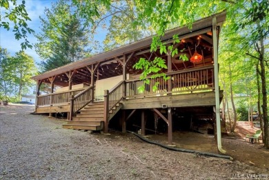 Lake life made easy--and fun! This Lake Gaston camper sits on a on River Ridge Golf Club in Virginia - for sale on GolfHomes.com, golf home, golf lot