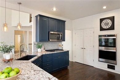 Classic details and modern updates come together beautifully in on The Golf Club of Georgia in Georgia - for sale on GolfHomes.com, golf home, golf lot