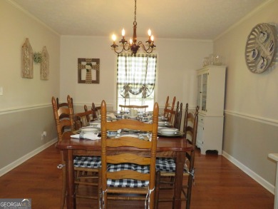 Sprawling brick ranch over full basement located in great area on Cherokee Golf and Country Club in Georgia - for sale on GolfHomes.com, golf home, golf lot