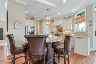 Boasting expansive golf views of the famed North Course at on Berkeley Hall Golf Club in South Carolina - for sale on GolfHomes.com, golf home, golf lot