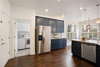 Classic details and modern updates come together beautifully in on The Golf Club of Georgia in Georgia - for sale on GolfHomes.com, golf home, golf lot