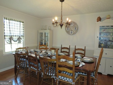 Sprawling brick ranch over full basement located in great area on Cherokee Golf and Country Club in Georgia - for sale on GolfHomes.com, golf home, golf lot