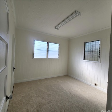 Charming 3-bedroom, 1.5-bath home in a prime Kapahulu location on Ala Wai Golf Course in Hawaii - for sale on GolfHomes.com, golf home, golf lot