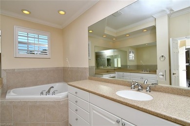 Indulge in resort-style luxury at this stunning top-floor end on Lely Resort Golf and Country Club in Florida - for sale on GolfHomes.com, golf home, golf lot