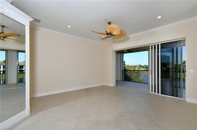 Indulge in resort-style luxury at this stunning top-floor end on Lely Resort Golf and Country Club in Florida - for sale on GolfHomes.com, golf home, golf lot