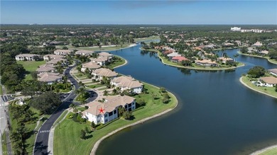 Indulge in resort-style luxury at this stunning top-floor end on Lely Resort Golf and Country Club in Florida - for sale on GolfHomes.com, golf home, golf lot