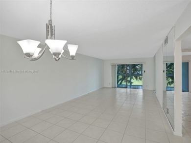 Just reduced. Pristine second floor condo in the gated community on Wynmoor Golf Course in Florida - for sale on GolfHomes.com, golf home, golf lot